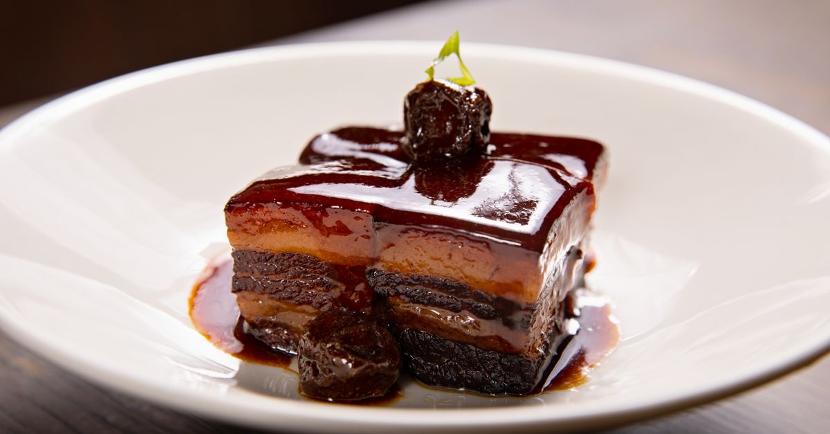 découvrez notre recette savoureuse de pork belly confit, une viande tendre et fondante cuite lentement pour un goût exceptionnel.